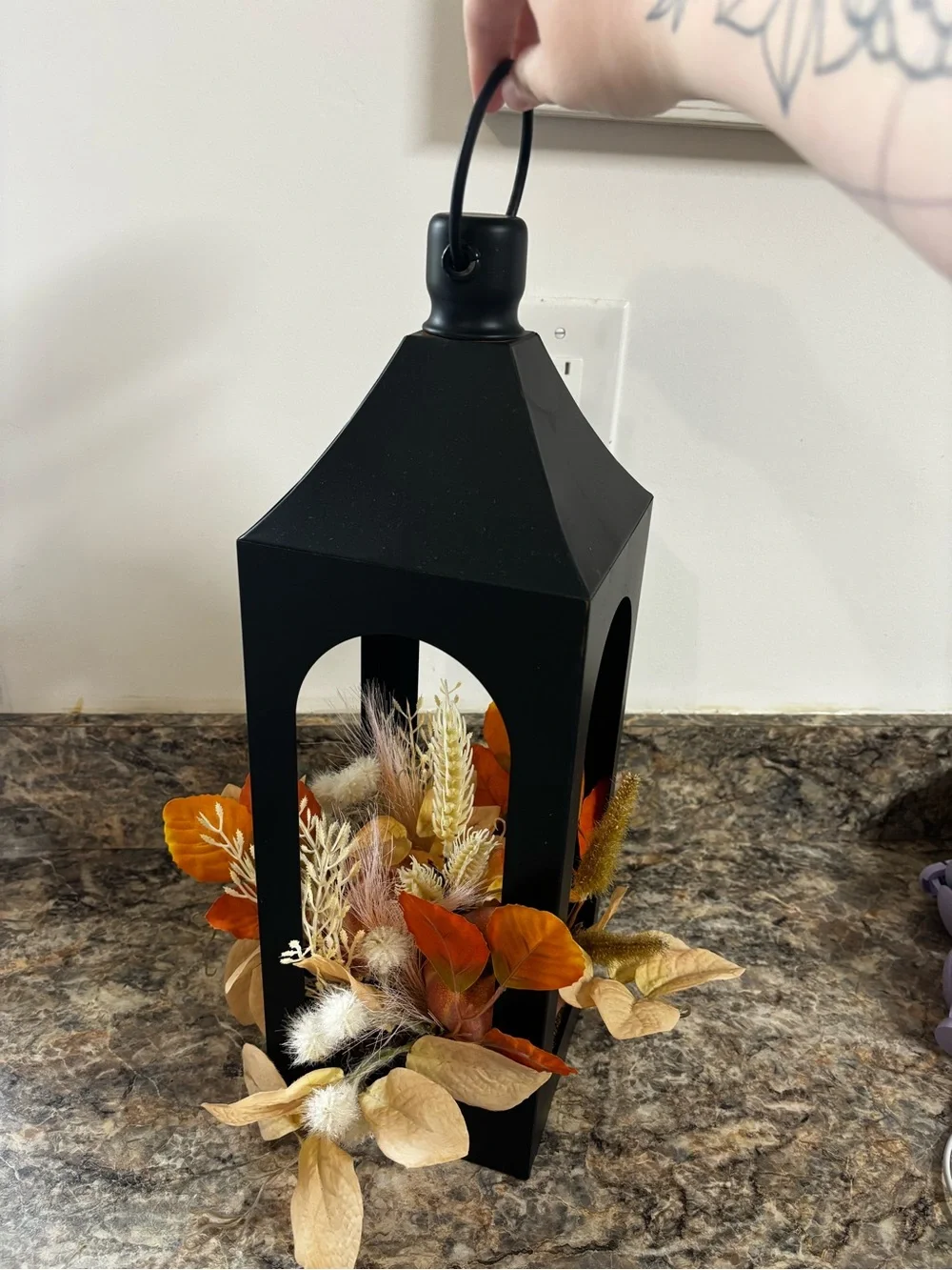 Black Metal Lantern with Autumn Foliage Accent